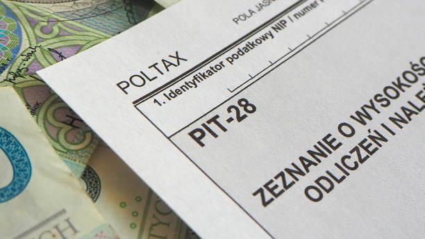 istock Polish banknotes and PIT28 tax form 2201425160