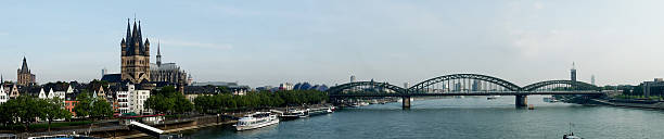 istock St Peter Cathedral and Hohenzollern Bridge over river Rhine in K 2201429492
