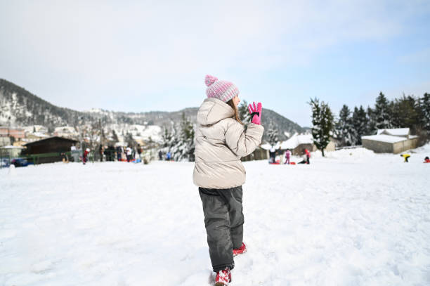 Ski holiday in snowy village.