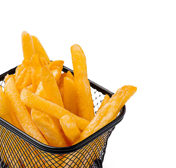 istock Crispy golden fries served in a small wire basket ready to enjoy 2201437147