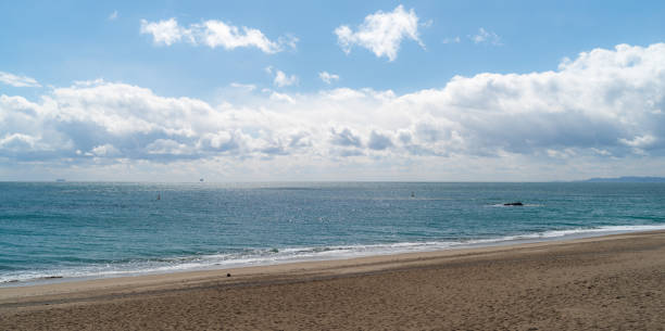 istock Blue sky, blue sea and sandy beach 2201437581