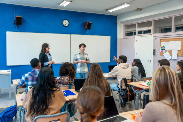 istock High school students listening to a presentation in classroom 2201440807