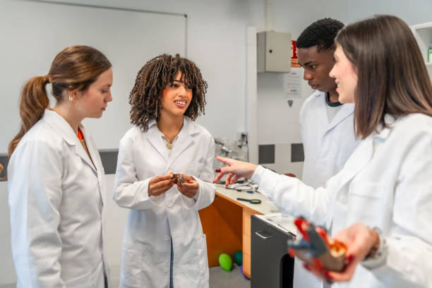 istock University students studying specimen during biology lesson 2201441047