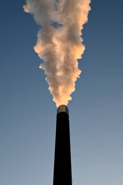 istock Steaming Smokestack in Hamburg 2201444844