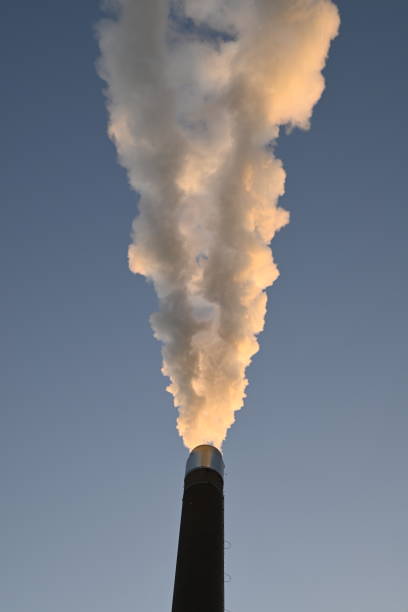 istock Steaming Smokestack in Hamburg 2201444866
