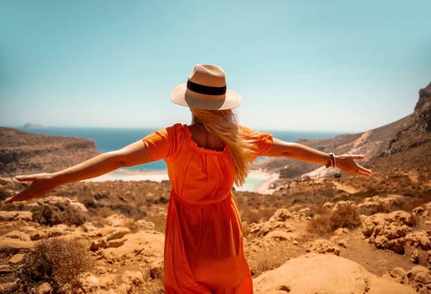 istock She enjoys breeze in ocean mountains 2201449271
