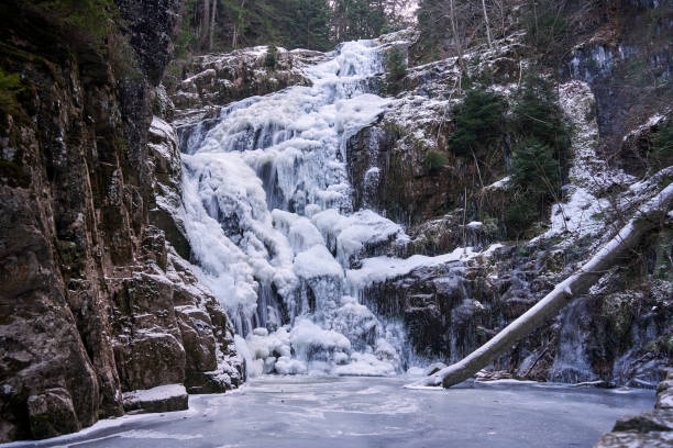 istock Frozen Kamieczyk Waterfall in Winter in the Karkonosze Mountains 2201450228