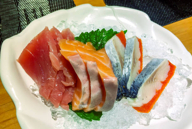 istock Set Sashimi On Ice Porcelain Dish At Japanese Restaurant. 2201450301