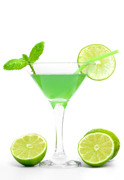 istock Isolated green cocktail, alcoholic drink with straw, lime and mint leaves 2201451424