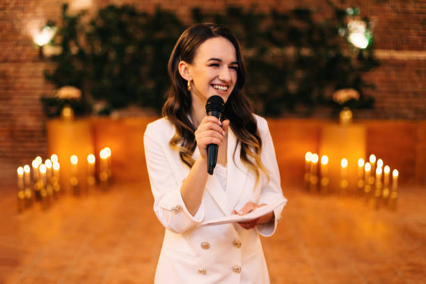 istock fun master of ceremonies with microphone in hall 2201462194