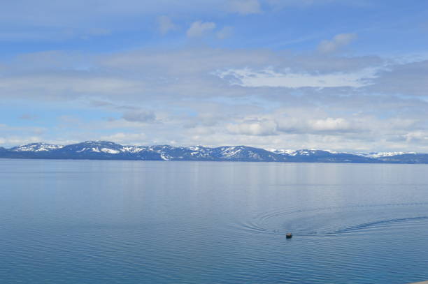 Serene Mountain View with Snowcapped Mountains on Yellowstone Lake in Yellowstone National Park Background Landscape Nature