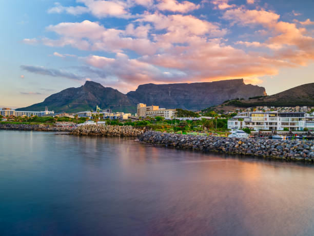 istock Dramatic Clouds Over Table Mountain Viewed from Mouille Point at Sunset, Cape Town, South Africa 2201468110