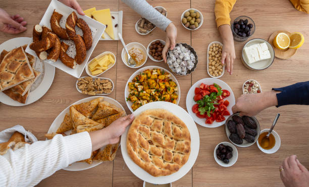 istock Turkish breakfast and Ramadan pita on the table for sahur meal or iftar meal 2201475102