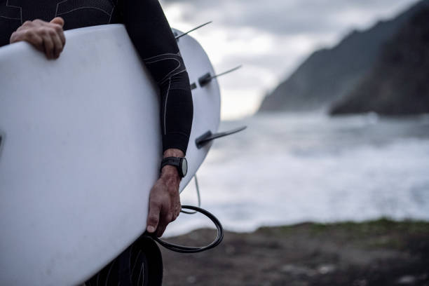 istock Surfing at Dawn. Out After Riding The Waves. 2201479219