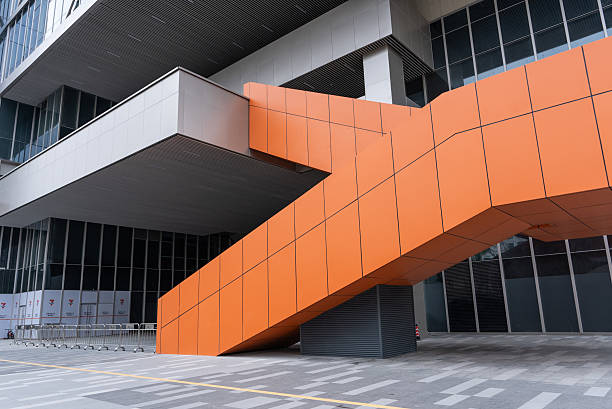 istock Orange stairs in an office building 2201479536