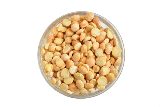istock Groats peas in a glass plate. Top view. 2201480115