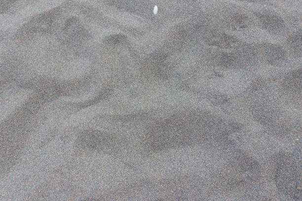 Texture of black volcanic sand for background