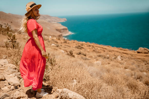 istock Woman Visiting breathtaking places in nature 2201480774