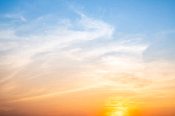 istock Beautiful , luxury soft gradient orange gold clouds and sunlight on the blue sky perfect for the background, take in evening,Twilight, Large size, high definition landscape photo 2201480852