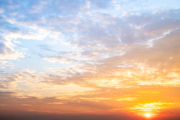 istock Beautiful , luxury soft gradient orange gold clouds and sunlight on the blue sky perfect for the background, take in evening,Twilight, Large size, high definition landscape photo 2201481098