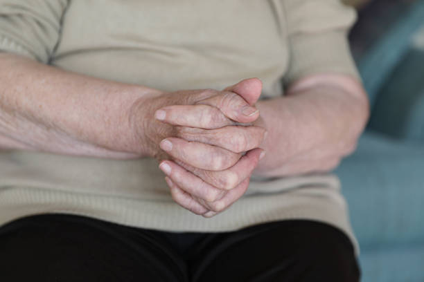 Detailed View of an 80+ Year-Old Woman’s Hands, Showing Timeworn Skin and Gentle Grace