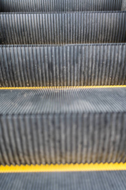 istock Escalator yellow steel line. 2201489002