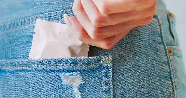 istock asian female removing a condom 2201490515