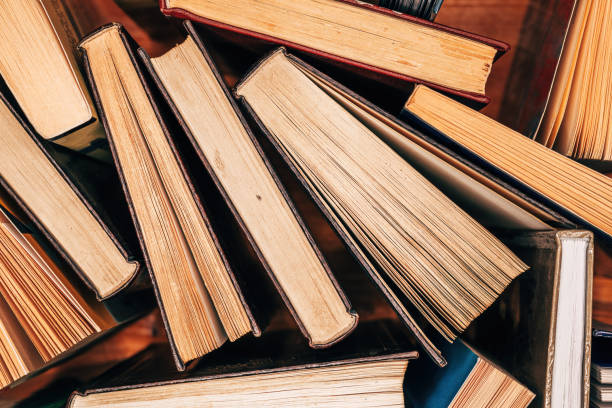 istock Old used hardcover books, education concept 2201492197