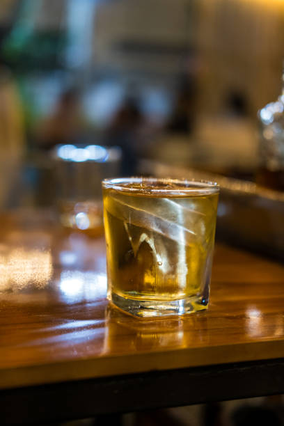 istock Whiskey glass with water and ice 2201492878