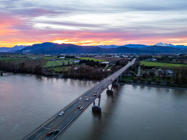 istock Sunset Over Fraser River Bridge in Mission, BC, Canada 2201496244