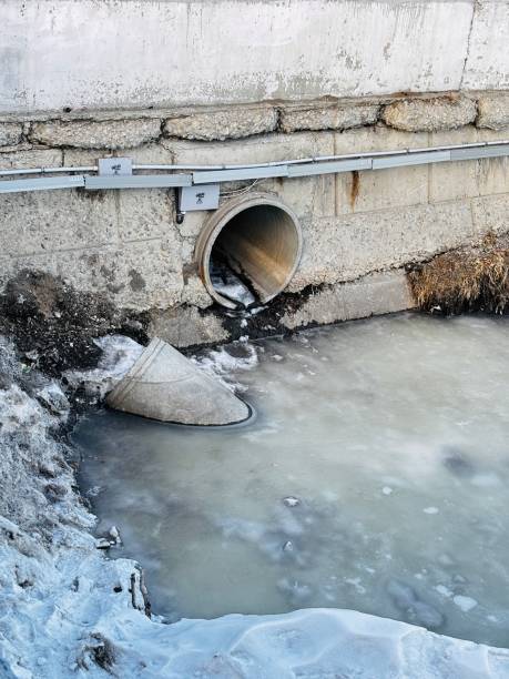 istock A wide water pipe surrounded by a crust of ice 2201498624