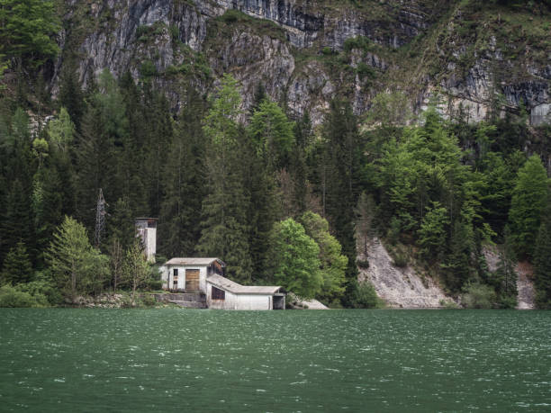 istock Abandoned building by Lago del Predil in forested landscape 2201499596