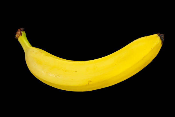 istock Yellow Ripe Banana Isolated on a Black Background 2201502822