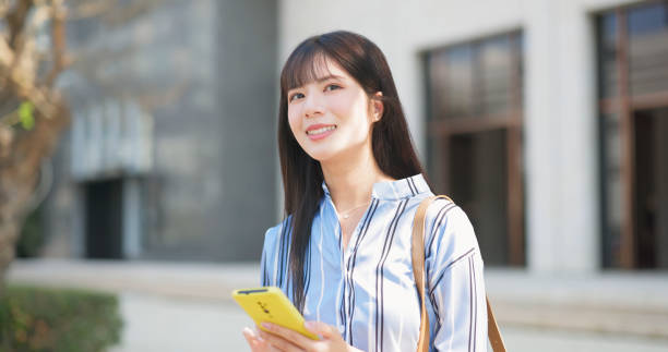 istock businesswoman check cellular info 2201507723