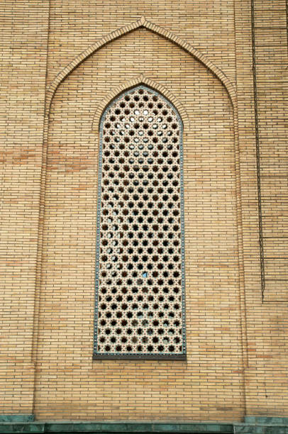 istock Window with pointed arch and ceramic lattice in  Bukhara, Uzbekistan 2201508591