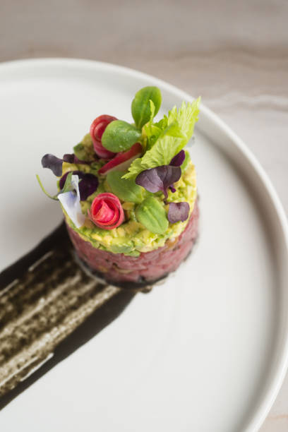 istock tuna tartar with avocado and salad 2201513732