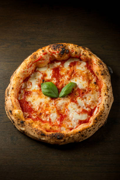 istock Margherita pizza, traditional with mozzarella tomato and basil leaf 2201514472