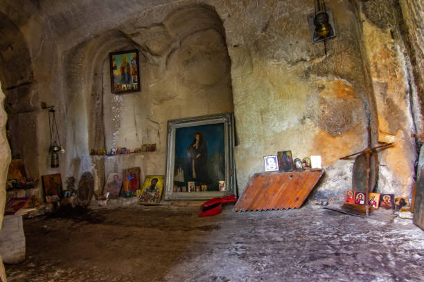 istock Ancient Cave Shrine with Religious Icons on the Fruska gora mountain 2201517110