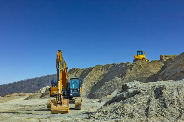 istock Heavy Machinery at a old quarry 2201517210