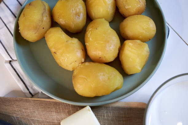 istock top view of boiled potatoes in a green ceramic plate 2201517213