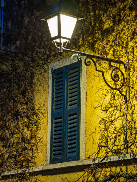Italian flag on street lamp in Varallo, Piedmont, Italy