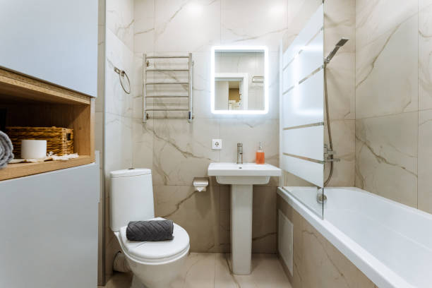 istock Discover a contemporary bathroom that showcases a chic shower and a comfortable bathtub, meticulously designed for both relaxation and convenience 2201519207