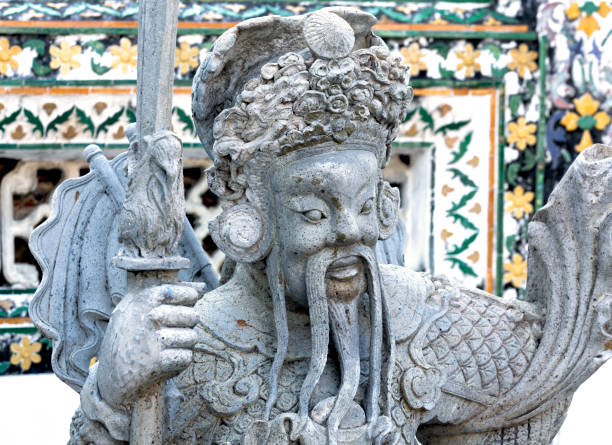 istock warrior with spear in front of the floral tower 2201522539