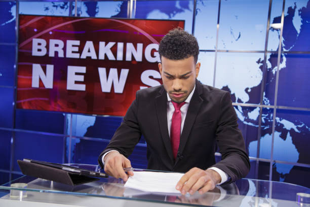 istock Breaking news male anchor 2201528775