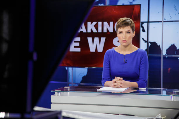 istock Breaking news female anchor 2201528845