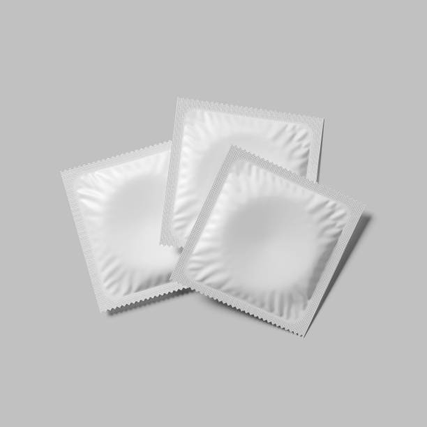 istock Three packages of condoms mockup. 3D rendering 2201530952