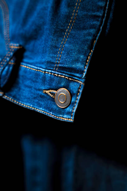 istock Close-Up of Button on Blue Jeans, Detailed Denim Design 2201541360