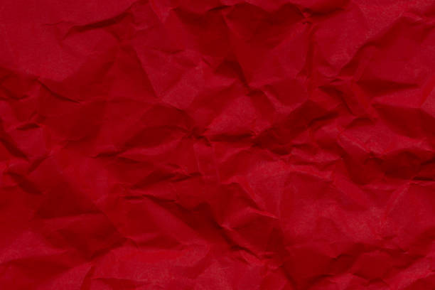 istock Red crumpled paper background,Red crumpled paper textured background. 2201541425