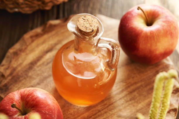 istock Apple cider vinegar in a glass bottle 2201549519