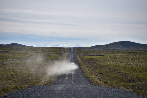 istock Car on gravel road 2201562693